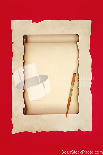 Image of Retro Writing Equipment with Ink Pen and Parchment Paper Scroll 
