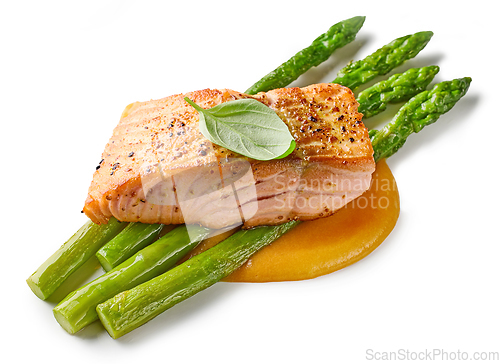 Image of fried salmon steak and asparagus