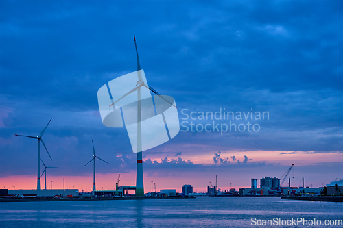 Image of Wind turbines in Antwerp port in the evening