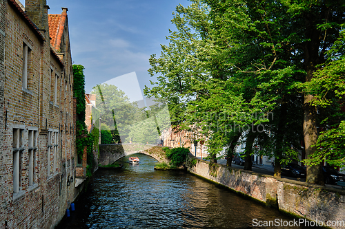 Image of Tourist boat in canal. Brugge Bruges, Belgium