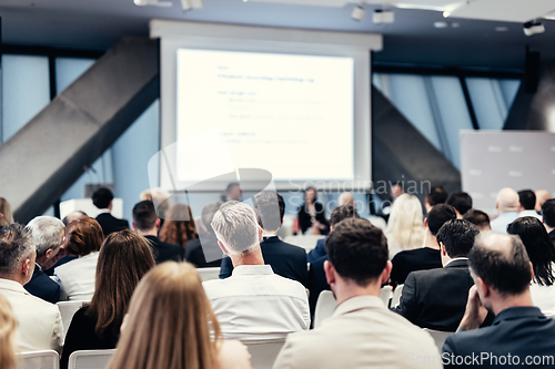 Image of Round table discussion at business conference meeting event.. Audience at the conference hall. Business and entrepreneurship symposium.