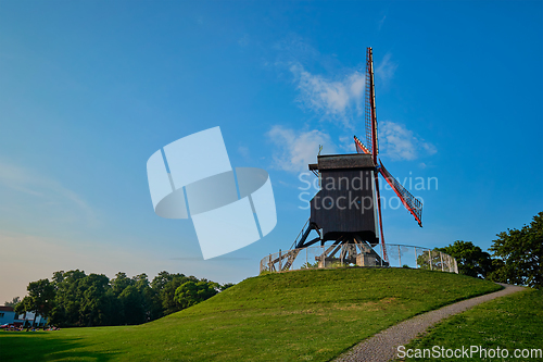 Image of Sint-Janshuismolen Sint-Janshuis Mill windmill in Bruges on sunset, Belgium