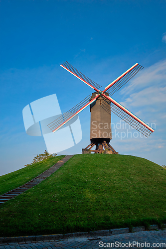 Image of Sint-Janshuismolen Sint-Janshuis Mill windmill in Bruges on sunset, Belgium