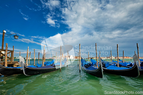 Image of Gondolas and in lagoon of Venice by San Marco square. Venice, Italy