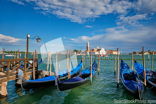 Image of Gondolas and in lagoon of Venice by San Marco square. Venice, Italy