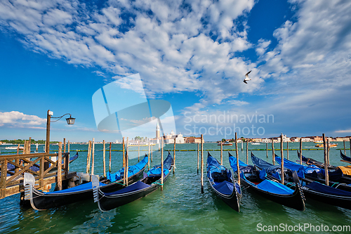 Image of Gondolas and in lagoon of Venice by San Marco square. Venice, Italy