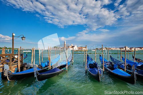 Image of Gondolas and in lagoon of Venice by San Marco square. Venice, Italy