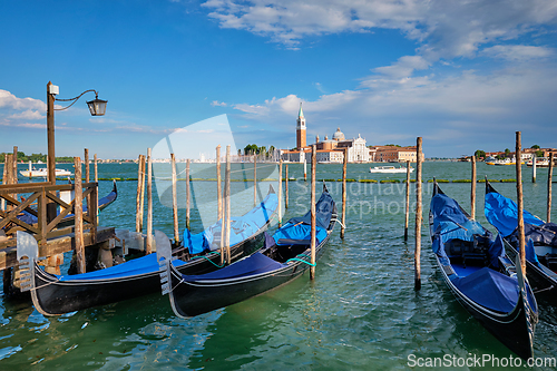 Image of Gondolas and in lagoon of Venice by San Marco square. Venice, Italy