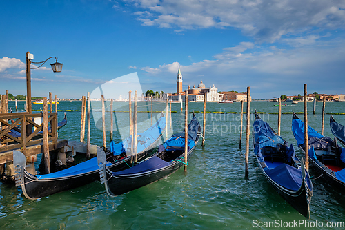 Image of Gondolas and in lagoon of Venice by San Marco square. Venice, Italy