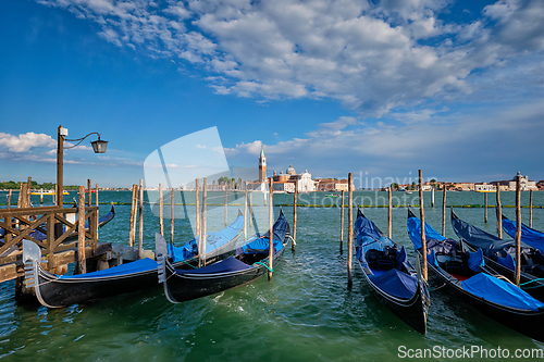 Image of Gondolas and in lagoon of Venice by San Marco square. Venice, Italy