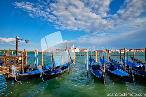 Image of Gondolas and in lagoon of Venice by San Marco square. Venice, Italy