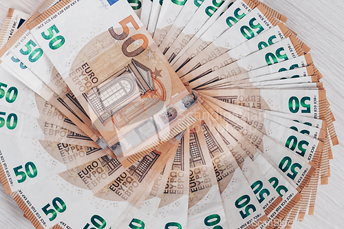 Image of Pile of 50 euro banknotes, business concept background