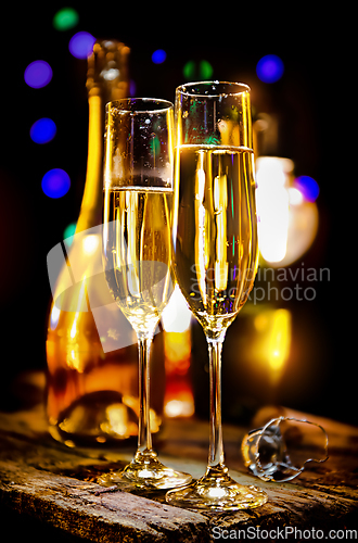 Image of Glass and bottle of champagne