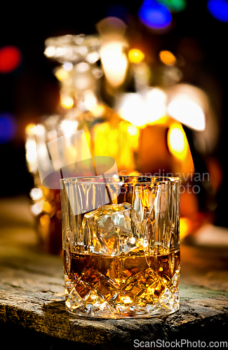 Image of Glass of whiskey and decante