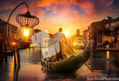 Image of Gondolier at sunset