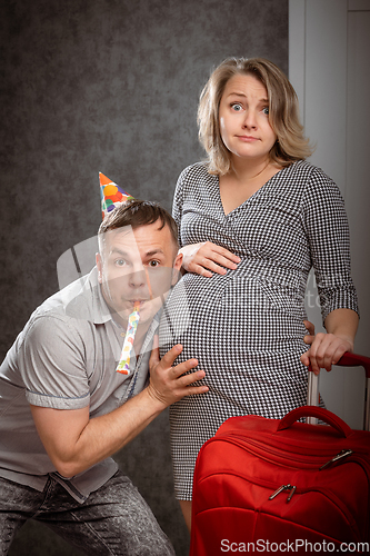 Image of Pregnant woman with husband ready for childbirth