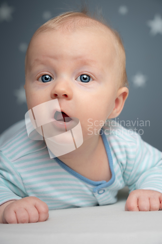 Image of Cute baby with blue eyes - portrait