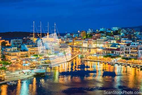 Image of Beautiful Agios Nikolaos town at night. Lasithi region of Crete island, Greece