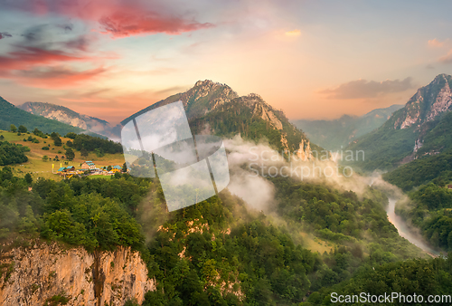 Image of Mountains and sunset sky