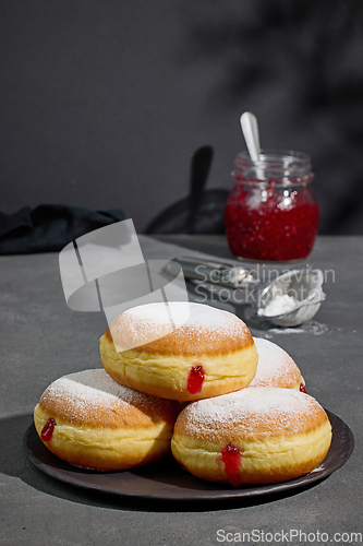 Image of jelly donuts on grey background