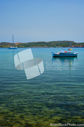 Image of Greek fishing boat in Aegean sea near Milos island, Greece