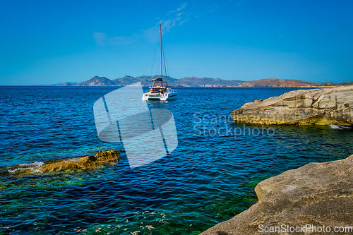 Image of Yacht boat at Sarakiniko Beach in Aegean sea, Milos island , Greece