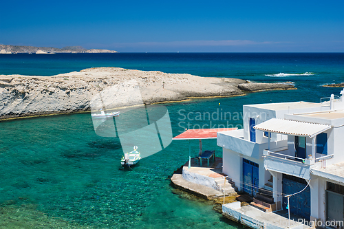 Image of Crystal clear blue water at MItakas village beach, Milos island, Greece.