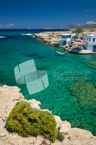 Image of Crystal clear blue water at MItakas village beach, Milos island, Greece.