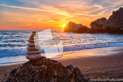 Image of Concept of balance and harmony - stone stack on the beach