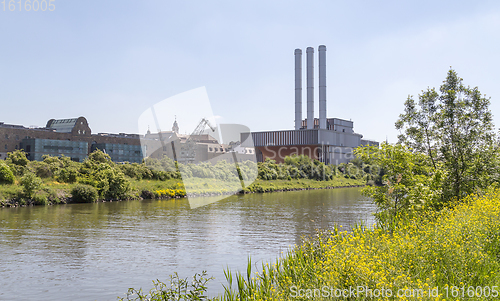 Image of factory near river