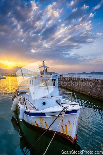 Image of Fishing boat in port of Naousa on sunset. Paros lsland, Greece