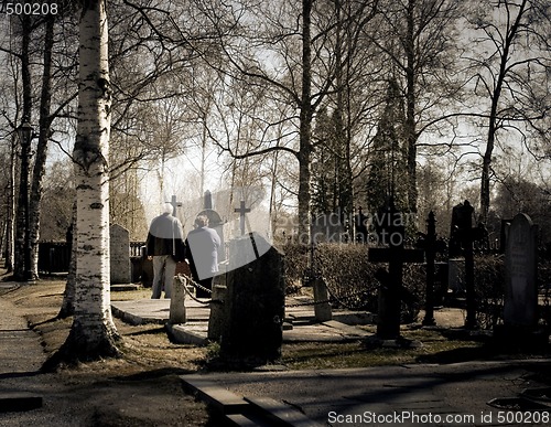 Image of Senior couple at a grave