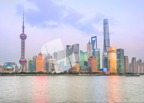 Image of Illuminated Shanghai skyline at twilight