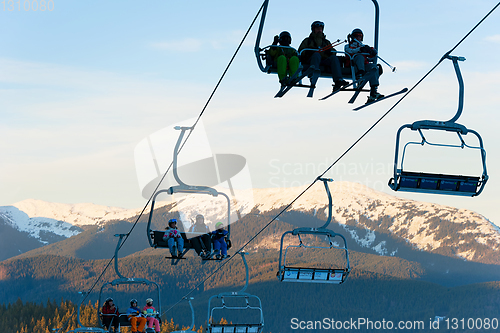 Image of Skiers ski lift mountains resort