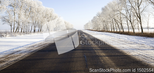 Image of wide paved winter road