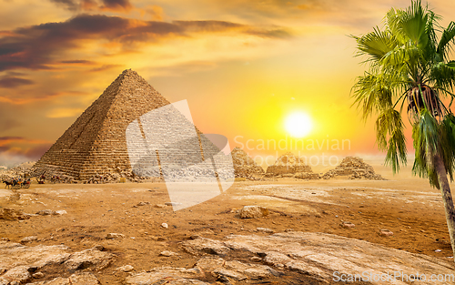 Image of Pyramids and sun