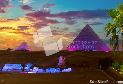 Image of Pyramids in the night lights