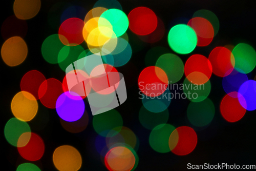 Image of Unfocused colorful lights, holiday background