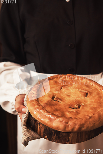 Image of Pie from potato meat cheese and vegetables