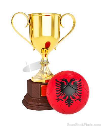 Image of Gold trophy cup and soccer football ball with Albania flag