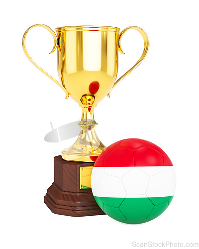 Image of Gold trophy cup and soccer football ball with Hungary flag