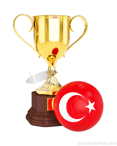 Image of Gold trophy cup and soccer football ball with Turkey flag