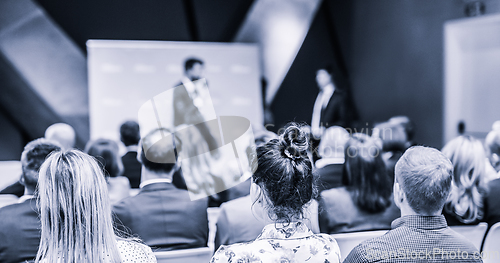 Image of Pitch presentation and project discussion at business convention or team meeting. Audience at the conference hall. Business and entrepreneurship symposium.