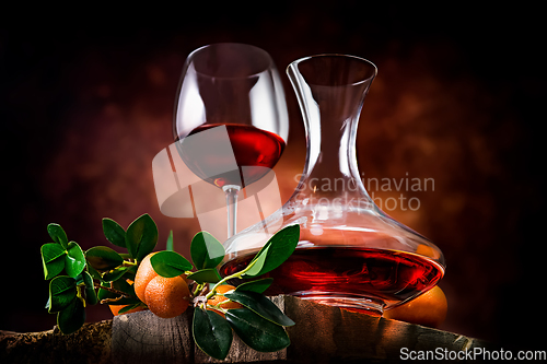 Image of Tangerine wine on a wooden table