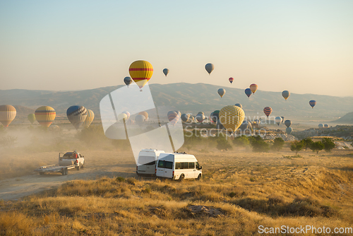 Image of The balloons are landing