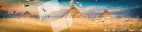 Image of Three pyramids in the desert