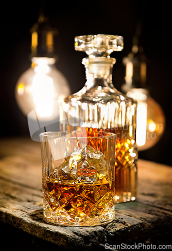 Image of Whiskey and lamp lighting