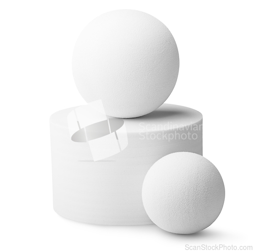 Image of White cylinder and two balls