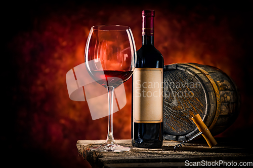 Image of Wine and barrel on a table