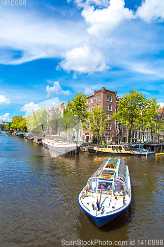 Image of Amsterdam canals and  boats, Holland, Netherlands.